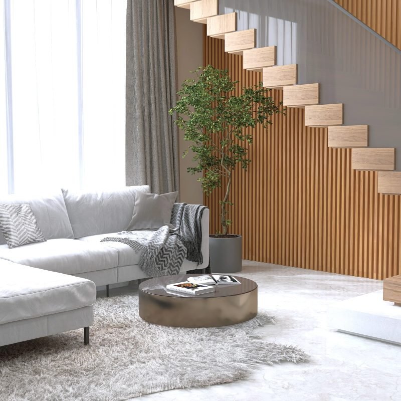 Luxury living room, gray corner sofa on shag rug, L shape wood cantilever stair staircase, tempered glass panel balustrades in sunlight from window on wood panel wall, white marble floor background 3D